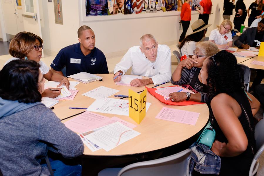 Image of small break out table during the Community Conversation on Housing